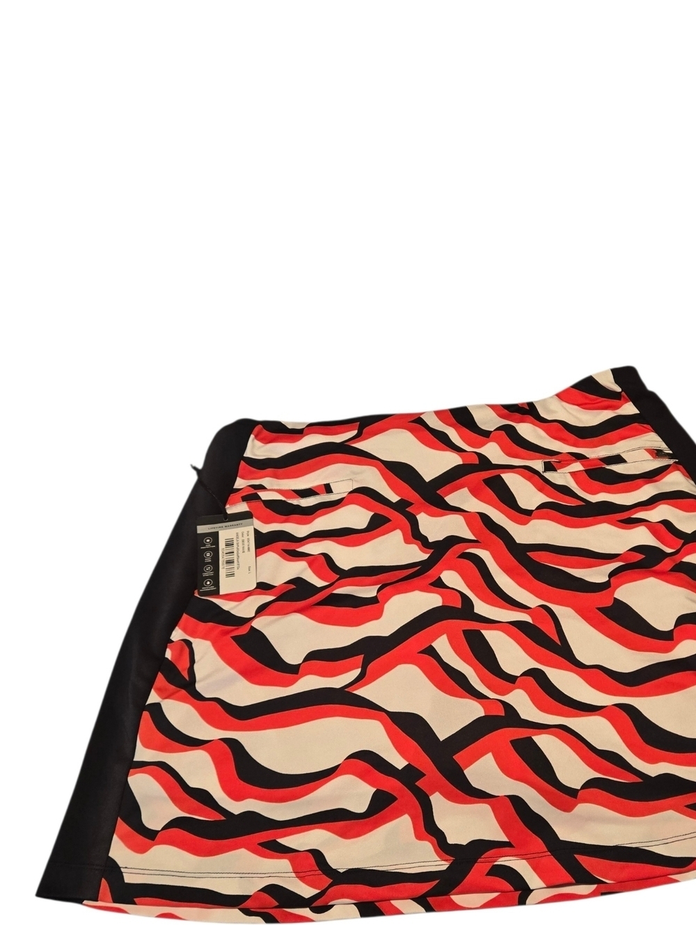 TAIL Women’s L Golf Skort Angela Deco Wave Orange Black Geometric UPF 50 NWT